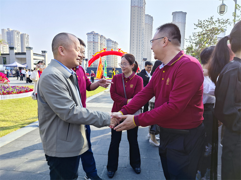 付四伟与惠卫职院副校长张钊琳.jpg
